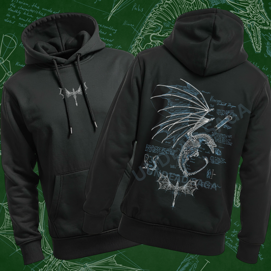Black pullover hoodie shown from the front and back, featuring a silver dragon graphic on the chest and a large matching dragon design over blueprint-style text on the back. The hoodie is displayed against a green chalkboard-style background with white sketch markings.