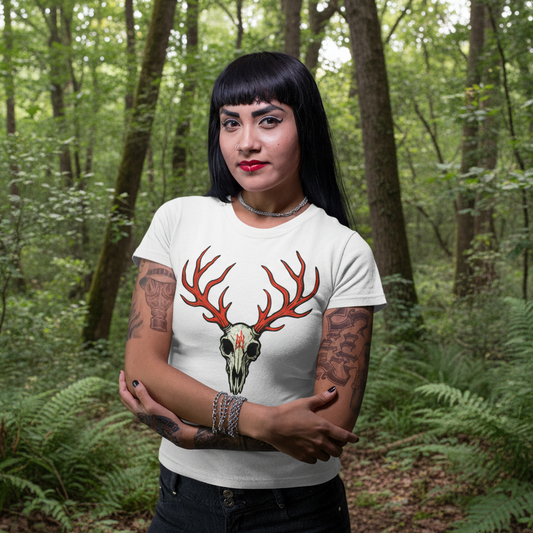 Woman wearing a white t-shirt with a deer skull design on a purple background